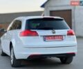 Белый Опель Инсигния, объемом двигателя 1.96 л и пробегом 210 тыс. км за 8900 $, фото 20 на Automoto.ua