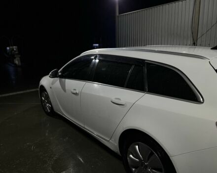 Белый Опель Инсигния, объемом двигателя 2 л и пробегом 325 тыс. км за 6599 $, фото 6 на Automoto.ua