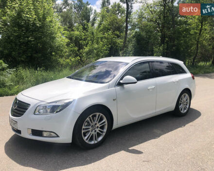 Білий Опель Інсігнія, об'ємом двигуна 2 л та пробігом 324 тис. км за 6600 $, фото 2 на Automoto.ua