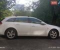 Белый Опель Инсигния, объемом двигателя 1.96 л и пробегом 390 тыс. км за 7400 $, фото 5 на Automoto.ua