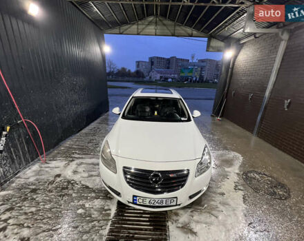 Білий Опель Інсігнія, об'ємом двигуна 2 л та пробігом 263 тис. км за 7700 $, фото 9 на Automoto.ua