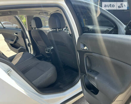 Білий Опель Інсігнія, об'ємом двигуна 1.96 л та пробігом 235 тис. км за 8700 $, фото 9 на Automoto.ua