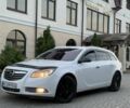 Белый Опель Инсигния, объемом двигателя 2 л и пробегом 294 тыс. км за 6499 $, фото 1 на Automoto.ua