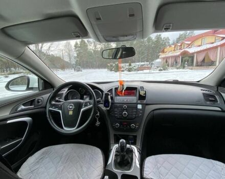 Белый Опель Инсигния, объемом двигателя 2 л и пробегом 310 тыс. км за 6800 $, фото 1 на Automoto.ua