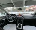 Білий Опель Інсігнія, об'ємом двигуна 2 л та пробігом 310 тис. км за 7600 $, фото 1 на Automoto.ua