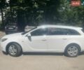 Белый Опель Инсигния, объемом двигателя 1.96 л и пробегом 310 тыс. км за 6500 $, фото 2 на Automoto.ua