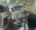 Білий Опель Інсігнія, об'ємом двигуна 2 л та пробігом 308 тис. км за 5519 $, фото 7 на Automoto.ua