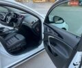 Белый Опель Инсигния, объемом двигателя 1.96 л и пробегом 210 тыс. км за 8900 $, фото 53 на Automoto.ua
