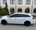 Белый Опель Инсигния, объемом двигателя 2 л и пробегом 294 тыс. км за 6499 $, фото 5 на Automoto.ua
