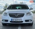 Білий Опель Інсігнія, об'ємом двигуна 2 л та пробігом 290 тис. км за 7900 $, фото 2 на Automoto.ua