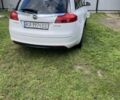 Білий Опель Інсігнія, об'ємом двигуна 2 л та пробігом 292 тис. км за 7950 $, фото 1 на Automoto.ua