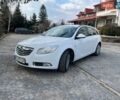Белый Опель Инсигния, объемом двигателя 2 л и пробегом 236 тыс. км за 7200 $, фото 1 на Automoto.ua