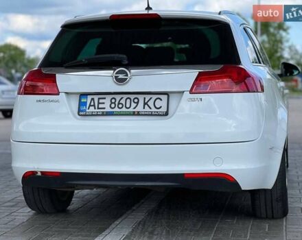 Білий Опель Інсігнія, об'ємом двигуна 2 л та пробігом 290 тис. км за 7900 $, фото 10 на Automoto.ua