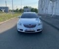 Білий Опель Інсігнія, об'ємом двигуна 1.96 л та пробігом 293 тис. км за 8700 $, фото 1 на Automoto.ua