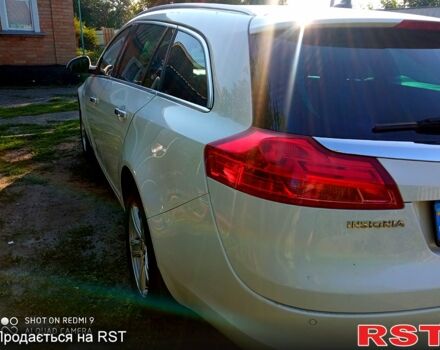 Белый Опель Инсигния, объемом двигателя 2 л и пробегом 200 тыс. км за 8299 $, фото 1 на Automoto.ua