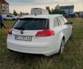 Білий Опель Інсігнія, об'ємом двигуна 2 л та пробігом 245 тис. км за 7300 $, фото 7 на Automoto.ua