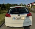 Білий Опель Інсігнія, об'ємом двигуна 2 л та пробігом 272 тис. км за 6900 $, фото 2 на Automoto.ua
