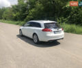 Белый Опель Инсигния, объемом двигателя 2 л и пробегом 219 тыс. км за 7950 $, фото 6 на Automoto.ua