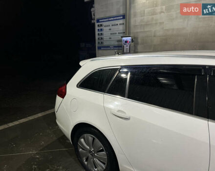 Белый Опель Инсигния, объемом двигателя 1.96 л и пробегом 295 тыс. км за 6450 $, фото 2 на Automoto.ua