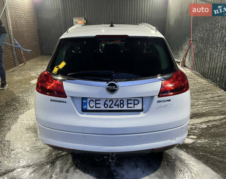 Білий Опель Інсігнія, об'ємом двигуна 2 л та пробігом 263 тис. км за 7700 $, фото 5 на Automoto.ua