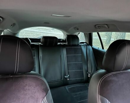 Білий Опель Інсігнія, об'ємом двигуна 2 л та пробігом 281 тис. км за 7000 $, фото 10 на Automoto.ua