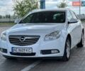 Білий Опель Інсігнія, об'ємом двигуна 2 л та пробігом 290 тис. км за 7900 $, фото 1 на Automoto.ua