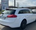 Білий Опель Інсігнія, об'ємом двигуна 2 л та пробігом 229 тис. км за 9900 $, фото 5 на Automoto.ua