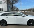 Білий Опель Інсігнія, об'ємом двигуна 2 л та пробігом 229 тис. км за 9900 $, фото 4 на Automoto.ua