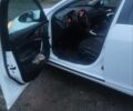 Белый Опель Инсигния, объемом двигателя 2 л и пробегом 320 тыс. км за 7000 $, фото 6 на Automoto.ua