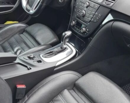 Білий Опель Інсігнія, об'ємом двигуна 2 л та пробігом 325 тис. км за 7600 $, фото 4 на Automoto.ua