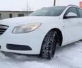 Белый Опель Инсигния, объемом двигателя 2 л и пробегом 245 тыс. км за 8299 $, фото 1 на Automoto.ua