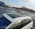 Білий Опель Інсігнія, об'ємом двигуна 2 л та пробігом 250 тис. км за 7750 $, фото 7 на Automoto.ua