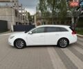 Білий Опель Інсігнія, об'ємом двигуна 1.96 л та пробігом 305 тис. км за 8500 $, фото 1 на Automoto.ua