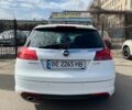 Білий Опель Інсігнія, об'ємом двигуна 2 л та пробігом 229 тис. км за 9900 $, фото 6 на Automoto.ua