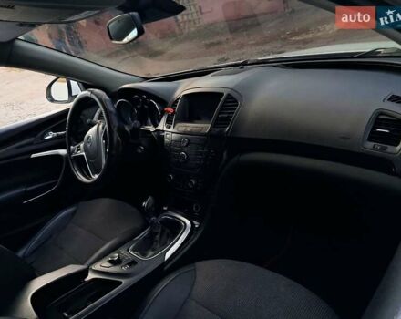 Опель Инсигния 2012 в Кривом Роге на Automoto.ua Белый Опель Инсигния, объемом двигателя 1.96 л и пробегом 317 тыс. км за 8100 $, фото 11 на Automoto.ua