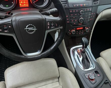 Білий Опель Інсігнія, об'ємом двигуна 0 л та пробігом 251 тис. км за 6449 $, фото 13 на Automoto.ua