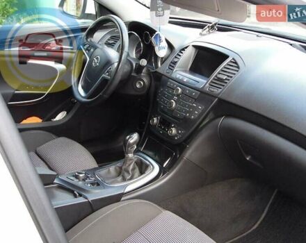 Білий Опель Інсігнія, об'ємом двигуна 1.96 л та пробігом 270 тис. км за 7700 $, фото 5 на Automoto.ua