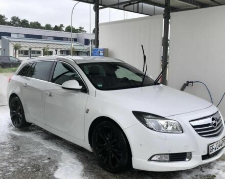 Білий Опель Інсігнія, об'ємом двигуна 2 л та пробігом 325 тис. км за 7600 $, фото 2 на Automoto.ua