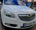 Белый Опель Инсигния, объемом двигателя 2 л и пробегом 319 тыс. км за 7563 $, фото 1 на Automoto.ua