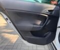 Білий Опель Інсігнія, об'ємом двигуна 2 л та пробігом 256 тис. км за 7999 $, фото 8 на Automoto.ua