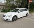 Белый Опель Инсигния, объемом двигателя 1.96 л и пробегом 305 тыс. км за 8500 $, фото 1 на Automoto.ua