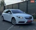 Белый Опель Инсигния, объемом двигателя 2 л и пробегом 130 тыс. км за 9300 $, фото 1 на Automoto.ua