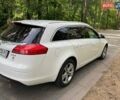 Белый Опель Инсигния, объемом двигателя 2 л и пробегом 305 тыс. км за 8600 $, фото 2 на Automoto.ua