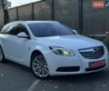 Белый Опель Инсигния, объемом двигателя 2 л и пробегом 130 тыс. км за 9300 $, фото 1 на Automoto.ua