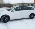 Білий Опель Інсігнія, об'ємом двигуна 2 л та пробігом 245 тис. км за 8299 $, фото 8 на Automoto.ua
