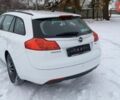Білий Опель Інсігнія, об'ємом двигуна 2 л та пробігом 245 тис. км за 8299 $, фото 2 на Automoto.ua
