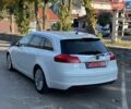 Белый Опель Инсигния, объемом двигателя 2 л и пробегом 130 тыс. км за 9300 $, фото 27 на Automoto.ua