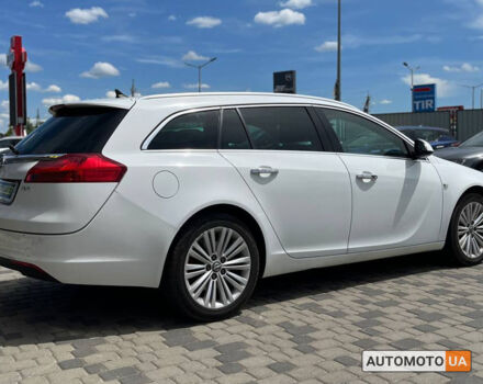 Белый Опель Инсигния, объемом двигателя 2 л и пробегом 213 тыс. км за 9900 $, фото 6 на Automoto.ua