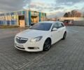 Білий Опель Інсігнія, об'ємом двигуна 2 л та пробігом 325 тис. км за 7600 $, фото 1 на Automoto.ua