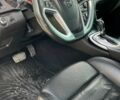 Білий Опель Інсігнія, об'ємом двигуна 2 л та пробігом 229 тис. км за 9900 $, фото 10 на Automoto.ua